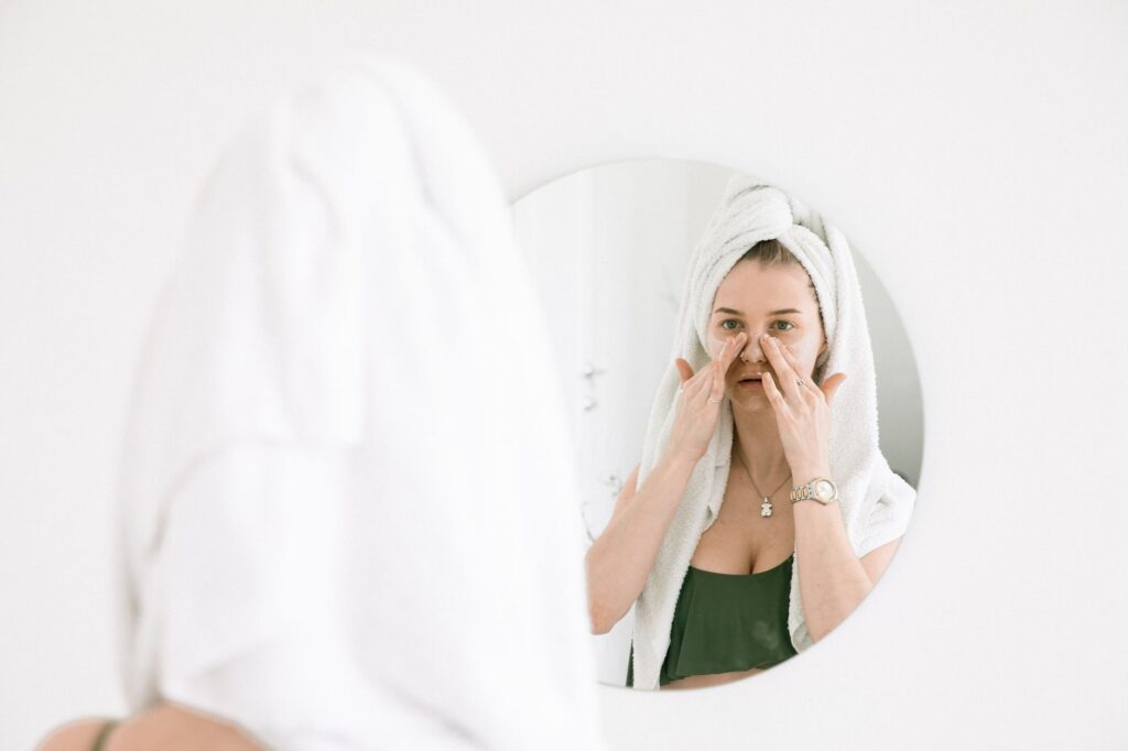 What to know about skin care routines that keep you glowing in summer like Hailey Bieber related image
